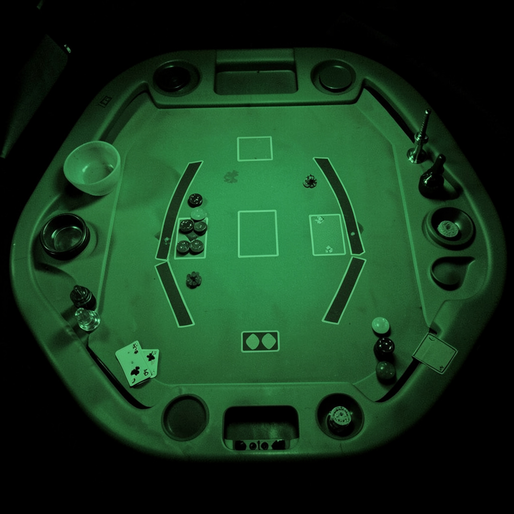 Two-tone green and black thumbnail of a dealt baccarat table layout